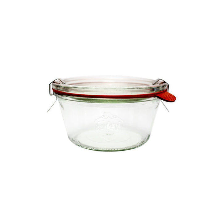 Clear glass 740 Weck Mold Jar with lid and clamps on white background