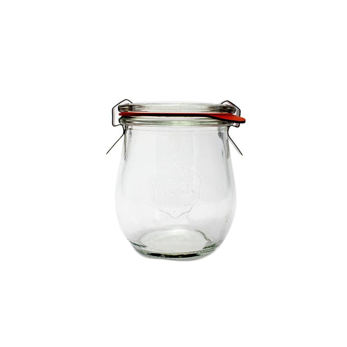 Clear glass 762 Weck Jar with lid and clamps on white background