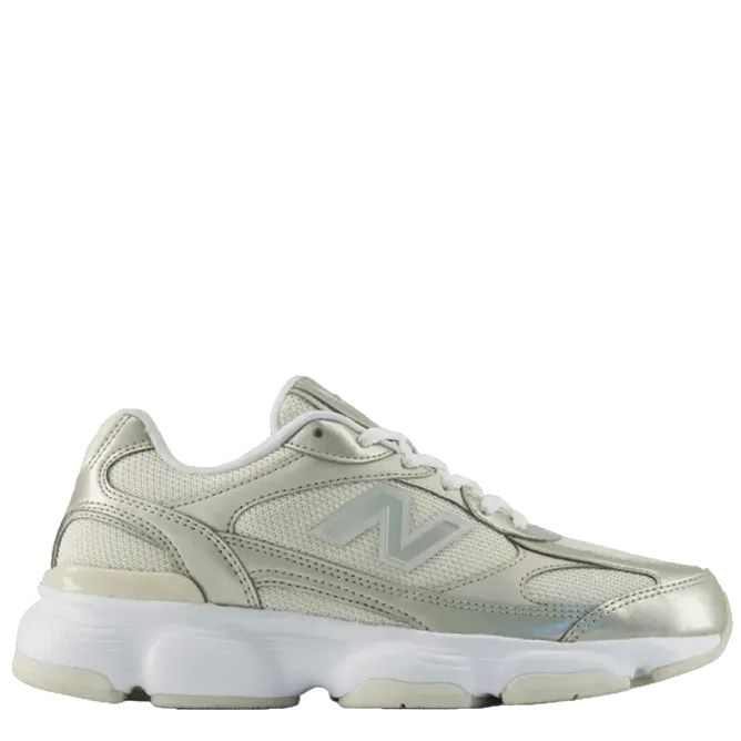 Silver sneaker with New Balance logo on a white background
