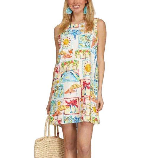 Woman wearing a colorful sleeveless dress with a pattern of animals and nature, holding a woven bag.