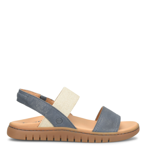 Blue sandal with beige strap on a white background