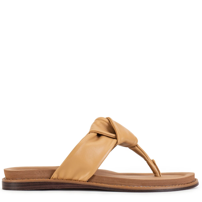 Tan sandal with a knot design on a white background