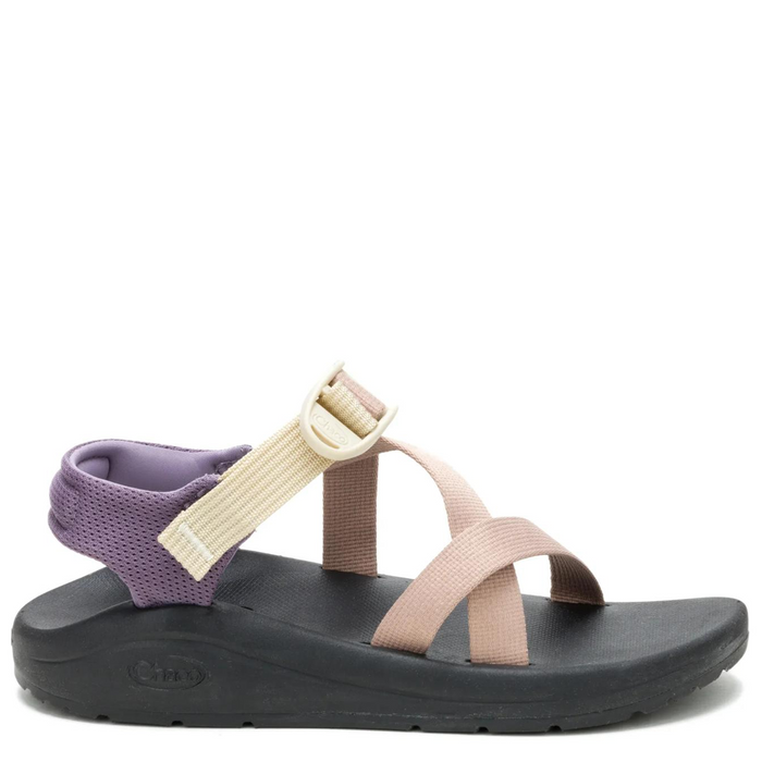 Sandal with purple and beige straps on a white background
