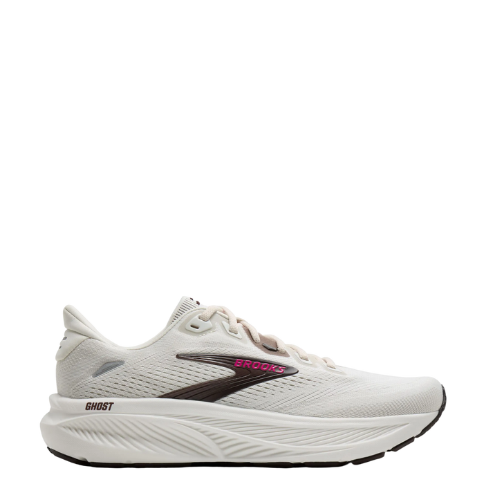 Brooks Ghost running shoe in off-white with a dark brown logo and pink branding, shown in a side profile on a light gray background.