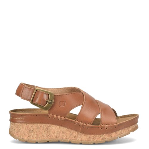 Brown sandal with cork sole on a white background