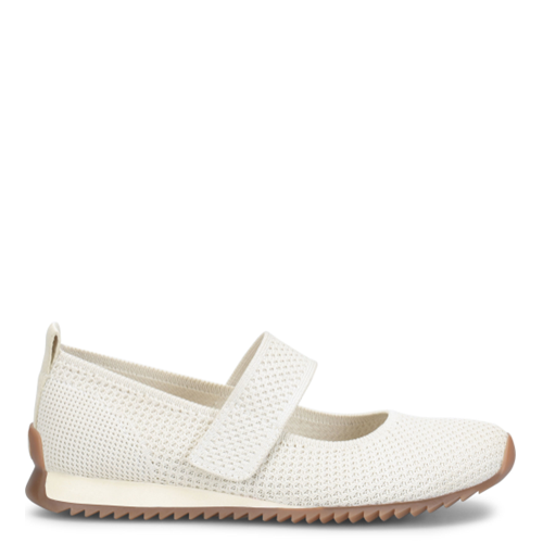 White flat shoe with a strap on a white background