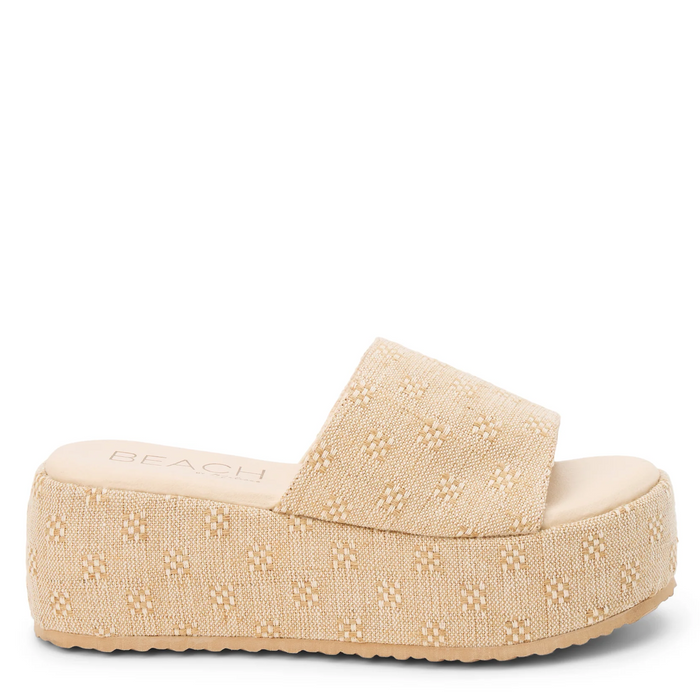 Beige platform sandal on a white background