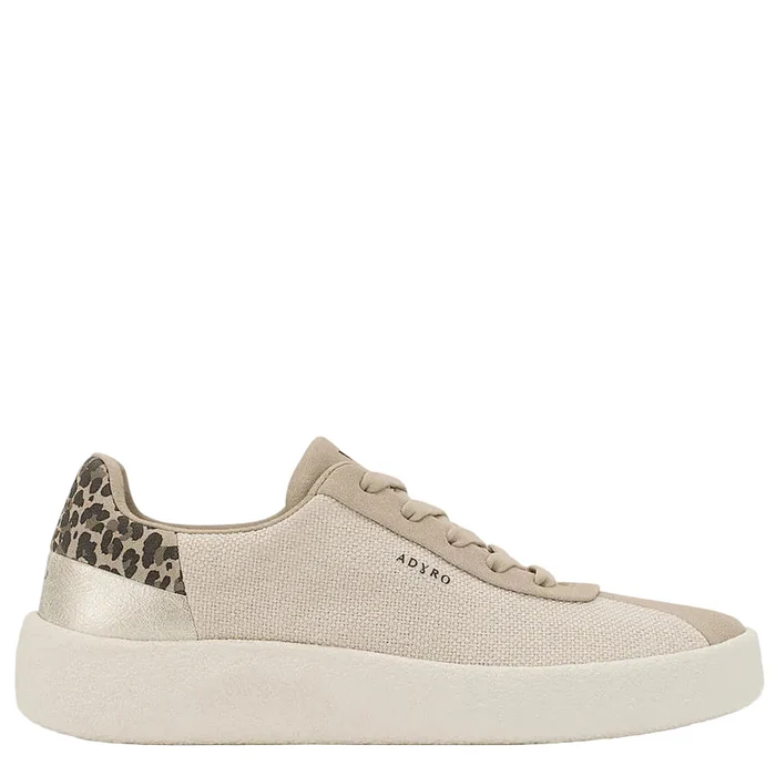 Beige sneaker with leopard print accents on a white background