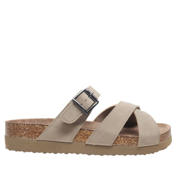 Beige sandal with a buckle on a white background