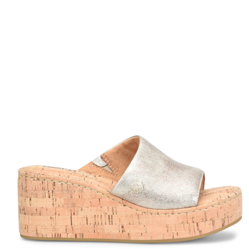 Cork wedge sandal with metallic strap on a white background