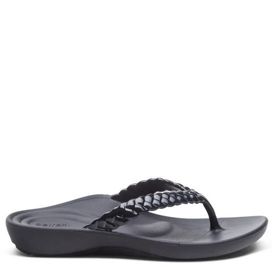 Black sandal with braided design on a white background